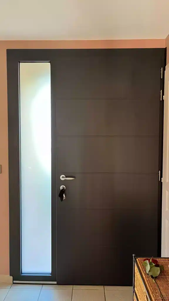 Porte vitrée aluminium par l'Atelier de l'Alu