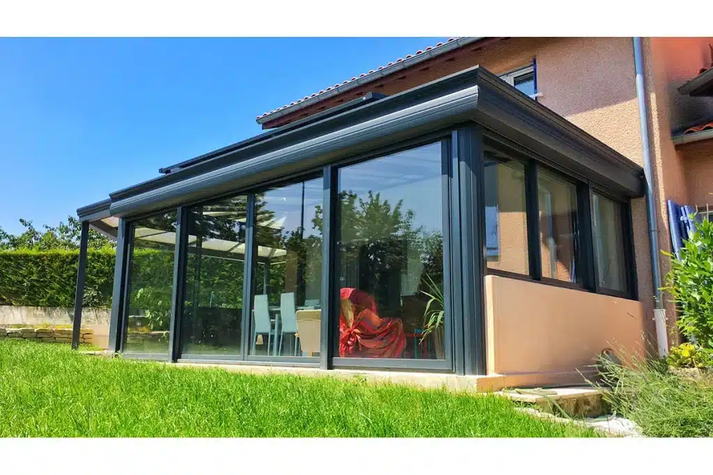 Véranda aluminium panneaux coulissants par l'Atelier de l'Alu