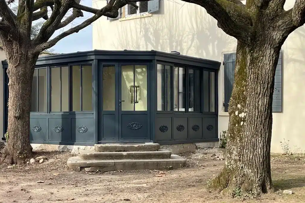 Véranda angle par l'Atelier de l'Alu