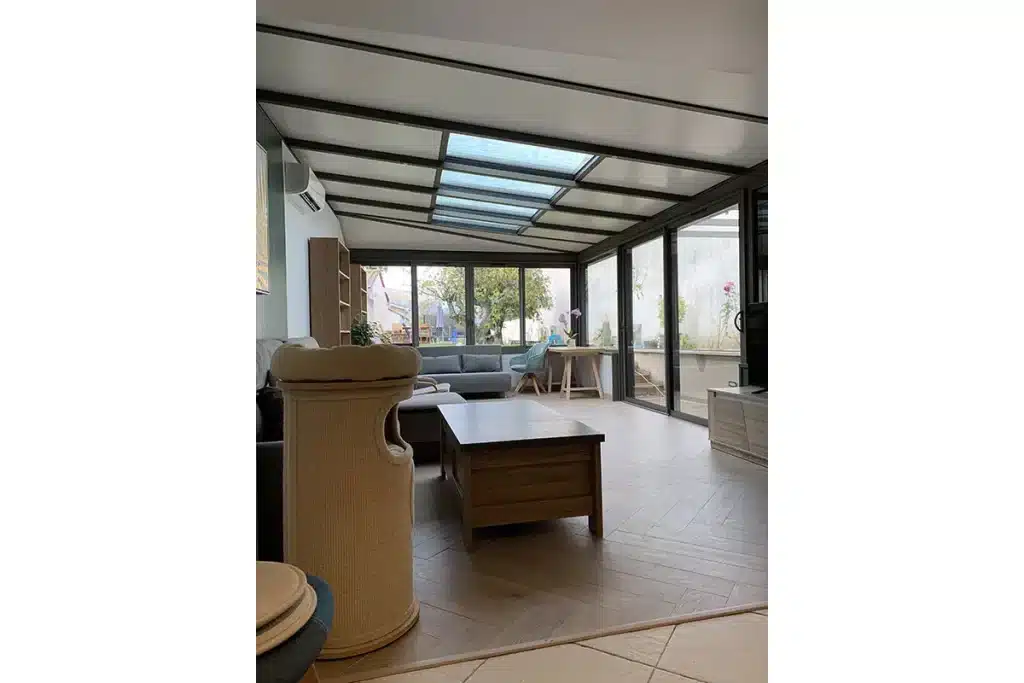 Véranda aluminium anthracite Dommartin par l'Atelier de l'Alu